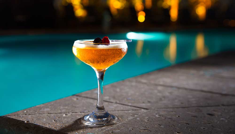cocktail drink by the pool deck